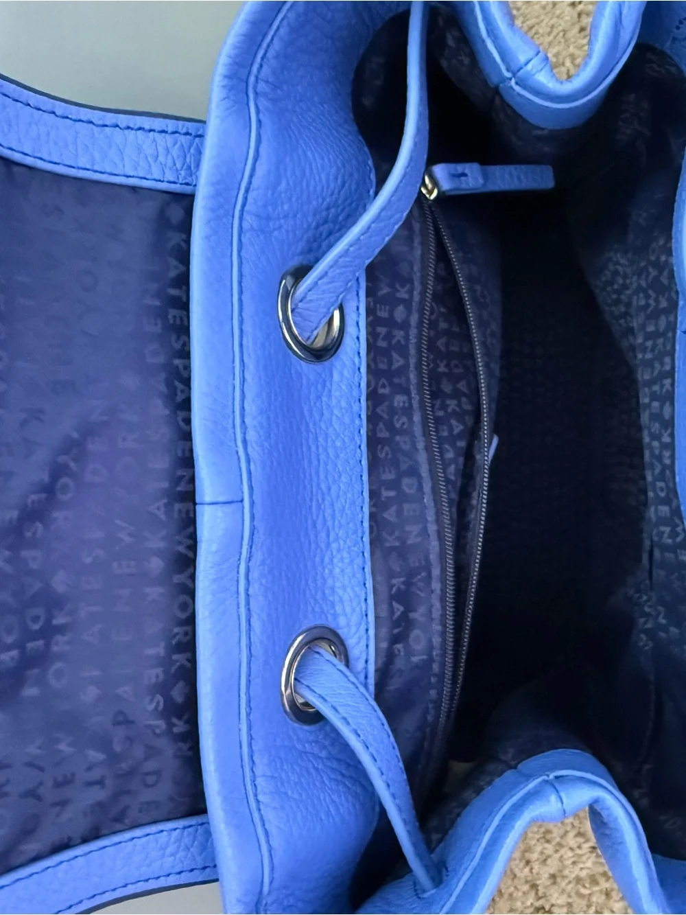 kate spade cobalt blue pebbled leather backpack with tassel